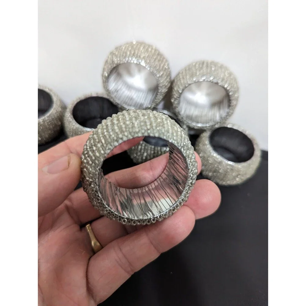 Silver Toned Jewel Look 7 piece Napkin Ring Set
